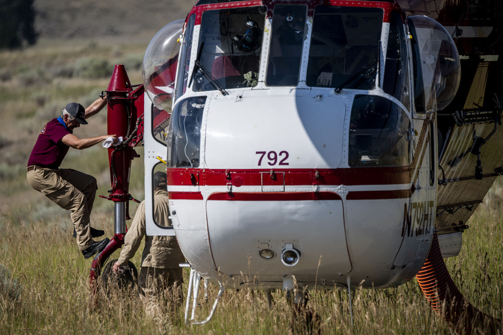 Climbing off the helicopter